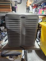 Front view showing Vornado air cleaner with louvered vents