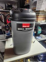 Front view showing Shop-Vac Wall Mount branding and overall condition