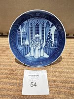Front view of plate showing full Lucia Fest scene and date