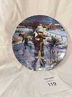 Front view of plate showing full winter hockey scene