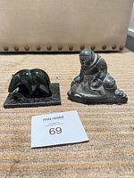 Both sculptures side by side showing size and form