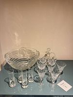 Full lot: bowl, decanter with stopper, stemmed glasses, tall shot glasses