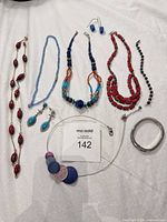 All 10 jewelry pieces laid out