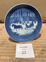 Front view of Royal Copenhagen 1984 Christmas plate showing scene and year