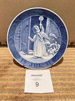 Front view of Royal Copenhagen commemorative plate showing full motif and date