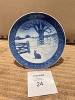 Front view of plaque showing full design and date