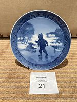 Front view of Royal Copenhagen Little Skaters porcelain plate dated 1965