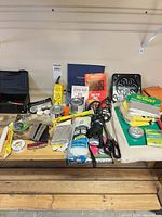 Full lot view displaying variety of emergency items on pallet