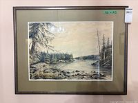 Full front view of framed artwork on wall showing frame, mat and image