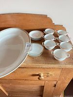 Full lot showing platter, cups, saucers, small plates