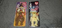Front view of both sealed Britannia and Glory Ty Beanie Baby bears