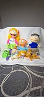 Group shot of all six Rugrats items on backdrop