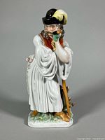 Front view of Herend Mournful Shepherd figurine