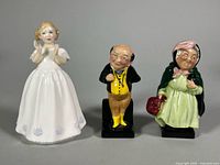 Front view of all three Royal Doulton figurines