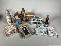 Front view of all seven stone cityscape sculptures