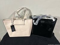 Front view of both tote handbags