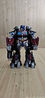 Front view of Optimus Prime figure standing upright