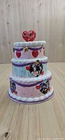 Front view of three-tier I Love Lucy cake cookie jar