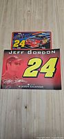 Front of Jeff Gordon 2004 calendar with large 24 and driver photo