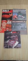 All five Dale Earnhardt Jr. calendars stacked