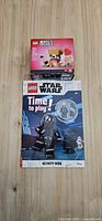 LEGO BrickHeadz box and Star Wars activity book unopened