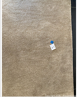 Full view of beige cut-pile rug
