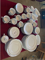 Full set arranged on table showing quantity and variety of pieces