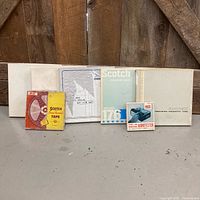 Front view of all seven tape reels with boxes