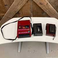 front view of three cassette players