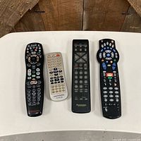 Front view of four remotes aligned