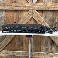 Both rack units stacked with power cables visible