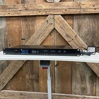 Front view of MX-8 showing buttons, LCD and logo