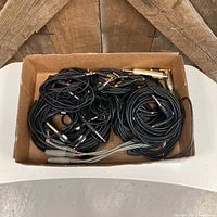 Overview of flat filled with coiled audio cables