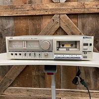 Front view of JVC KD-A5 cassette deck showing controls and cassette compartment