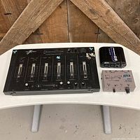 Mixer, ART DTI, and Apex APA1 grouped on table