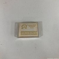 Front view showing Omega logo and Diamond Stylus label