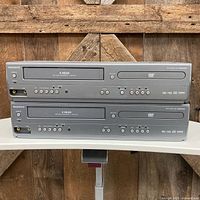 Front view of both Magnavox CMWD2206 units stacked