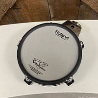 Top view of Roland PD-85 mesh drum pad showing head and logo