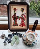 All lot items grouped on window ledge