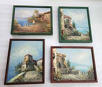 all four framed paintings front view