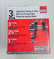 Front of retail box showing product name, size and image of vise