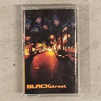 Front of cassette case with album artwork