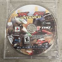 Front of game disc showing MX vs ATV Untamed label in jewel case