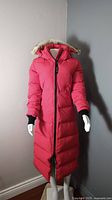 Front view of red Canada Goose Mystique parka on mannequin