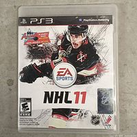 Front view of NHL 11 PS3 game case