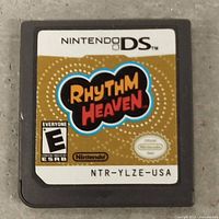 Front of Nintendo DS Rhythm Heaven cartridge showing label, rating, model