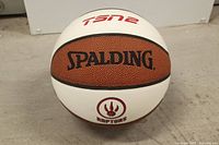 Front view showing Spalding wordmark and Raptors logo
