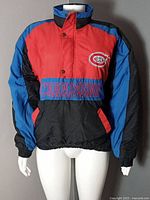 Front view of red/black/blue Montreal Canadiens pullover jacket on mannequin
