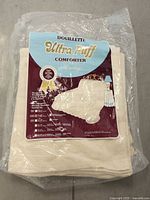 Front of packaged Ultra Puff comforter with label visible