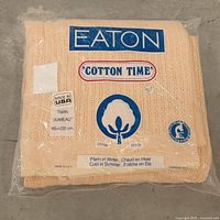 Front of sealed Eaton Cotton Time twin comforter package showing brand and cotton logo